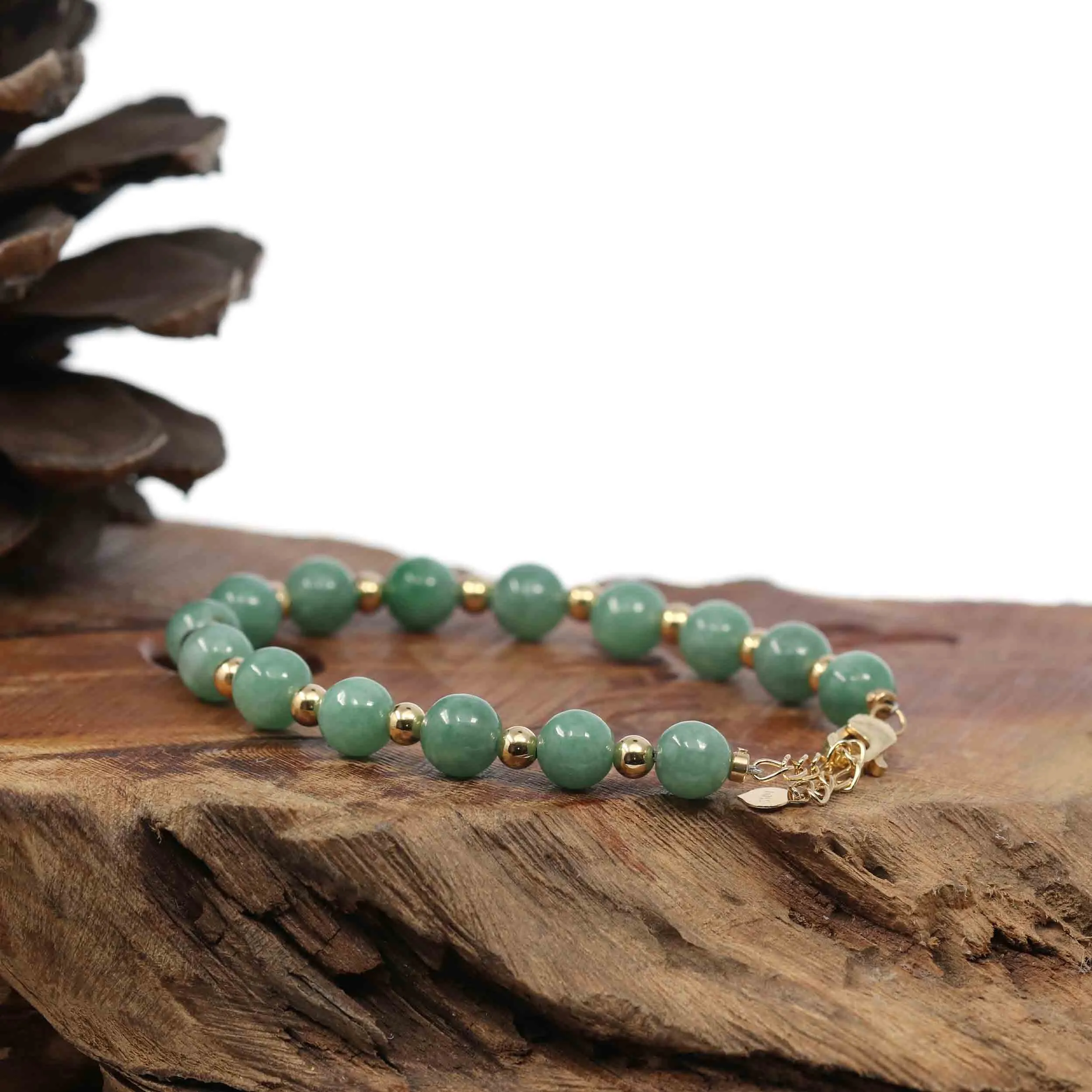 Baikalla Genuine Green Jadeite Jade Round Beads Bracelet With 18K Yellow Gold Clasp and Gold Beads ( 7 mm )