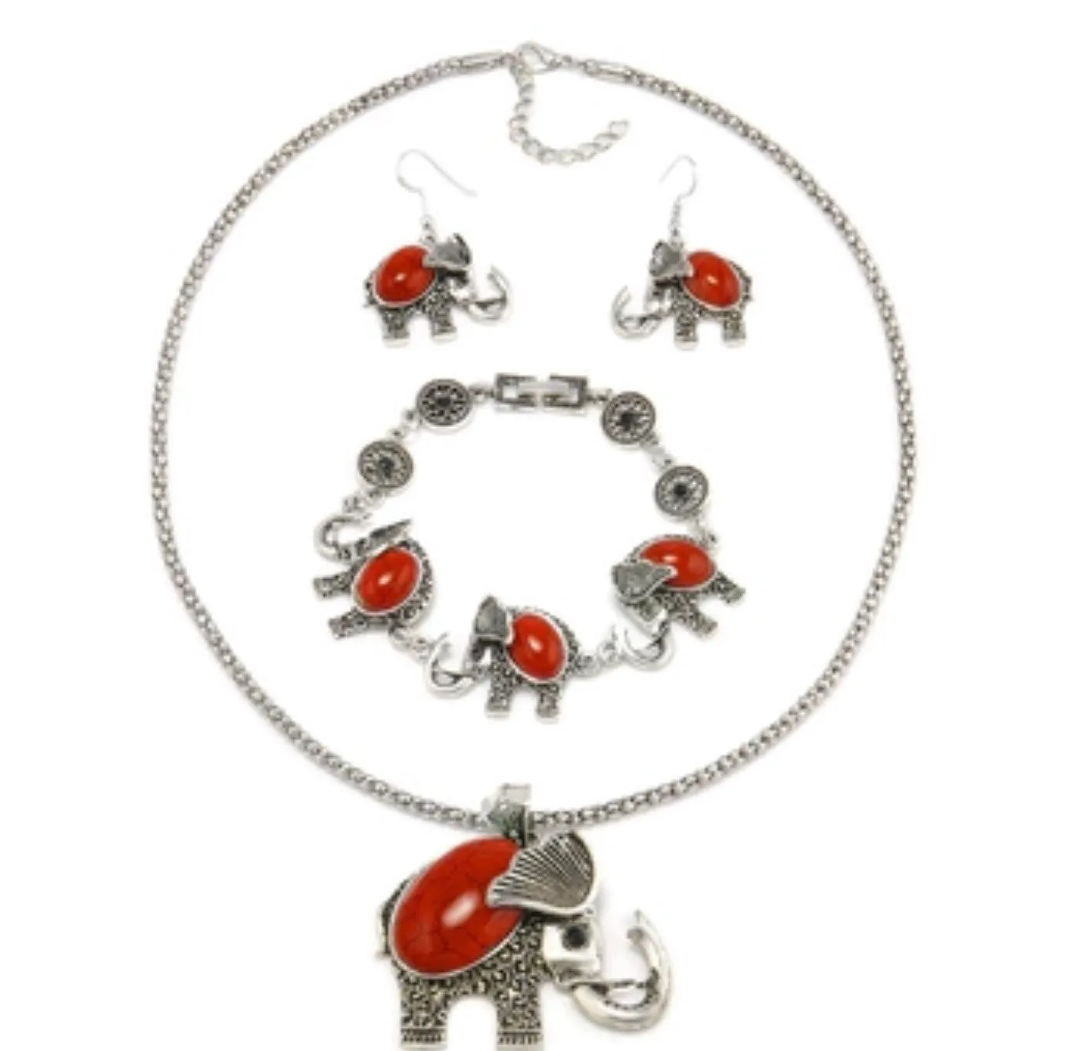 Silvertone elephant set with necklace, bracelet, and earrings